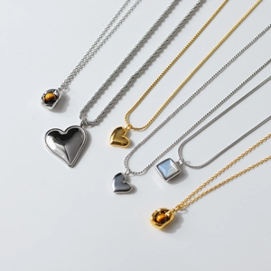 Minimalist gold and silver heart pendant necklaces in multiple stylish chain designs