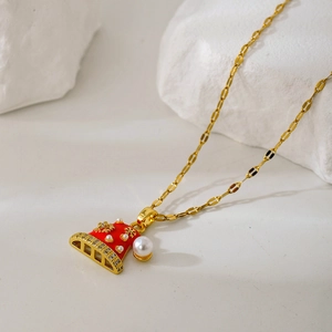 Goldene Weihnachtskette mit rotem Emaille-Glockenanhänger, Perlen und Zirkonia