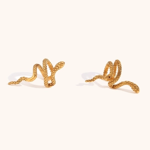 Detailed close-up of 18K gold plated snake ear cuffs showing fine scale textures