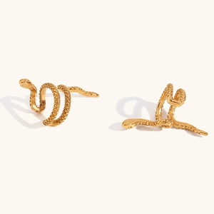 Macro shot of gold plated snake ear cuff featuring detailed scale texture and spiral design