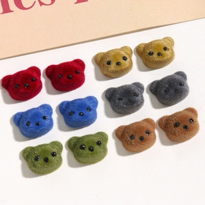 Detail of colorful velvet flocked bear charms for DIY jewelry and hair accessories