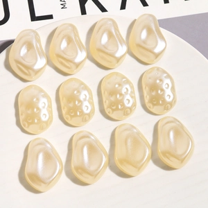 Irregular cream resin pearls with textured and wavy surfaces for DIY jewelry making