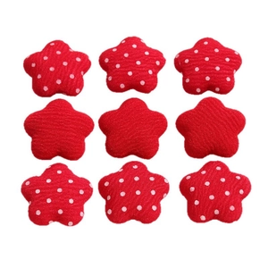 Nine red star fabric buttons with polka dot patterns for DIY hair accessories and crafts