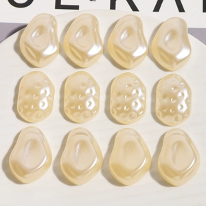 Detailed view of irregular pearlescent acrylic beads for DIY jewelry and hair accessories