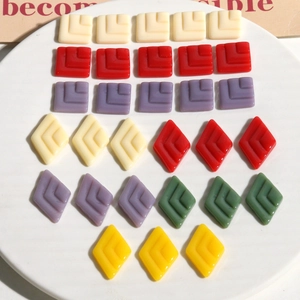 DIY jewelry accessories with layered geometric resin squares and diamond shapes in various colors