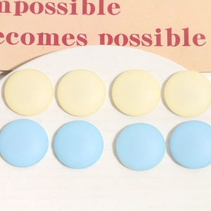 8pcs matte resin round accessories in light blue and yellow on white plate
