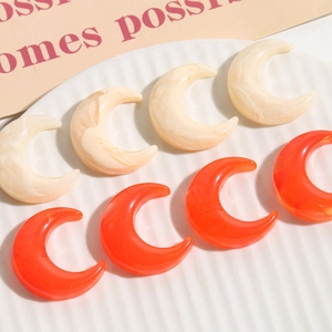 Marbled and transparent resin moon charms for DIY jewelry and hair accessories