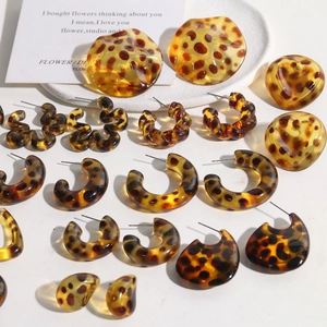Detailed collection of leopard print resin earrings in various geometric shapes and styles