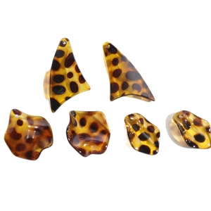 Leopard print leaf-shaped resin pendants for DIY jewelry earrings on white background