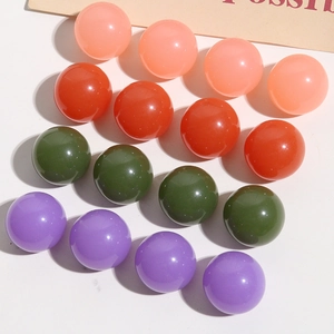 Polished resin round dome beads in pink, red, green, and purple for DIY jewelry making