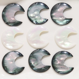 Detailed view of nine iridescent resin crescent moon charms for DIY jewelry making