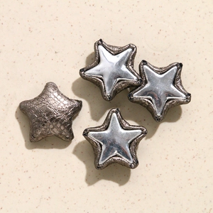 Stervormige DIY tasaccessoires met zilveren metalen midden en slangenlederen randen