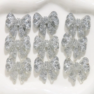 Sparkling silver resin 3D bows for DIY crafts and jewelry making, set of 9 pieces