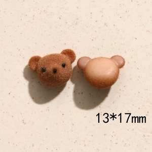 Detailopname van 13x17mm bruine geflokte teddybeerkoppen voor DIY sieraad accessoires