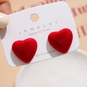 Red velvet heart stud earrings with 925 silver needles on white display card
