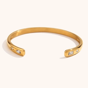 Adjustable 18K gold-plated bangle with geometric star, drop, and rectangle zircons