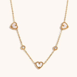 18K gold plated necklace with three white shell heart pendants and round zircon accents