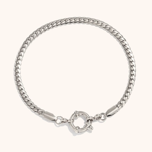 Detailed close-up of a silver stainless steel snake chain bracelet with large spring ring clasp