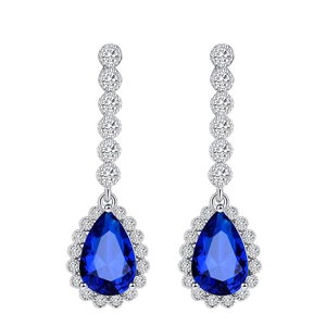 Elegant silver pear-cut blue sapphire drop earrings with AAA cubic zirconia halo