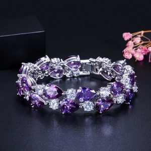 Elegant silver bracelet with double-row purple pear-shaped gems and round white zircons