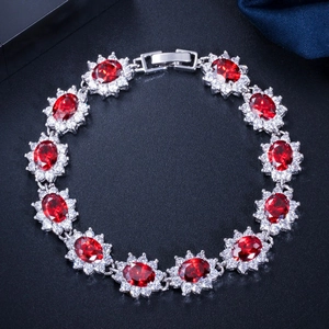 Bracelet fleuri plaqué or blanc 18K avec rubis ovales rouges et zircons scintillants