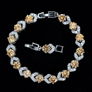 Elegante pulsera de cristal champán con hojas plateadas y piedras de circonio AAA