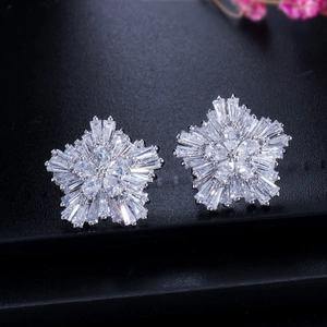 Elegant snowflake stud earrings with sparkling baguette and pear-cut cubic zirconia
