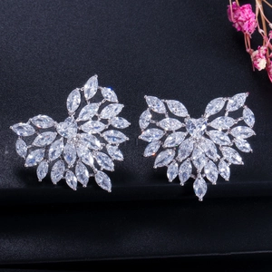 Exquisite silver-tone marquise-cut zircon heart earrings set on a dark elegant background