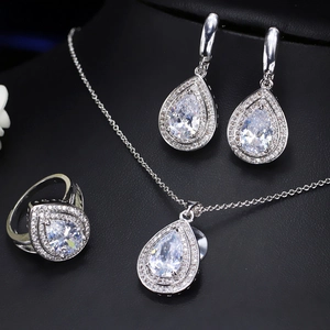Elegant silver necklace ring and earrings set with pear cut clear cubic zirconia stones