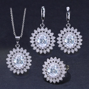 Sparkling sunflower jewelry set with oval zircon necklace, earrings and ring in silver