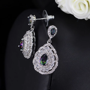 Elegant silver pear-shaped drop earrings with mystic topaz and zircon pavé accents