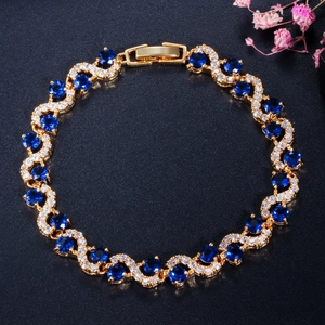Exquisite gold-plated copper bracelet with deep blue zircons and white diamond pavé settings