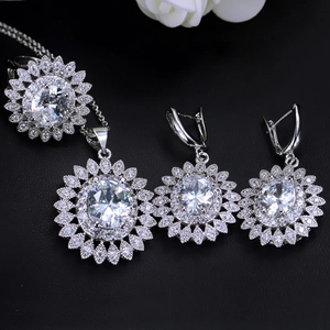 Detailed macro shot of sun flower jewelry set with sparkling oval cubic zirconia stones
