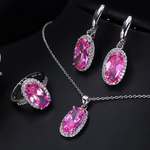 Elegant silver S925 bridal jewelry set with oval pink gemstones and halo diamonds