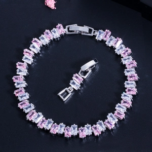 Macro detail of luxury pink and white cubic zirconia bracelet with silver metal setting