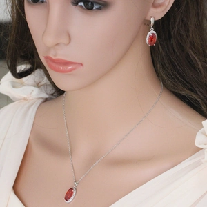 Fashion bridal jewelry set featuring oval red zircon pendant necklace and drop earrings