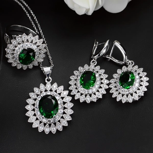 Sunflower silver jewelry set with emerald oval gemstones including ring necklace earrings