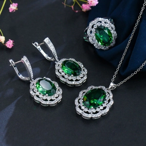 Elegant 4-piece bridal jewelry set with emerald green stones and 925 silver finish