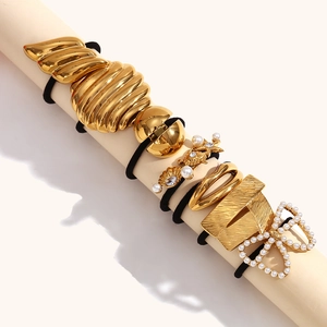 6-piece 18K gold-plated ocean-themed hair ties with shell, starfish, and pearl charms