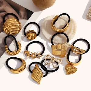 Set of 10 vintage 18K gold plated stainless steel hair ties with shell and heart motifs