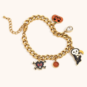 Bracciale Halloween in acciaio placcato oro 18K con ciondoli a zucca e teschio