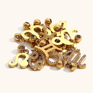 18K gold plated stainless steel 12 zodiac pendants with sparkling white cubic zirconia