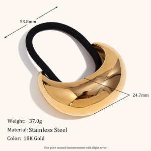 Polished 18K gold-plated stainless steel crescent moon hair tie with black elastic band