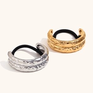 Minimalist double-layered hammered metal hair ties in gold and silver stainless steel