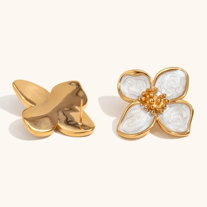 Elegant 18K gold plated petal earrings with white enamel and a pearlescent satin finish