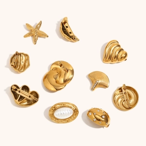 Gold-plated stainless steel brooch set featuring heart and shell designs on white background