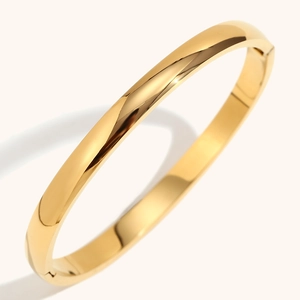 Minimalist 18K gold plated stainless steel wide bangle with high polish finish