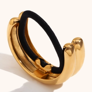 Detail view of double-layered 18K gold-plated stainless steel hair cuff with black elastic
