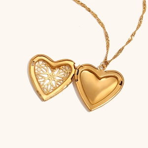 Gold hollow heart locket necklace in 18K plated stainless steel with photo compartment