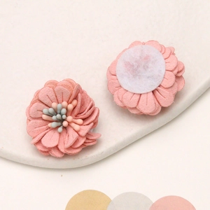 Detail of 3cm soft pink daisy fabric flower for DIY hair clips and fashion accessories